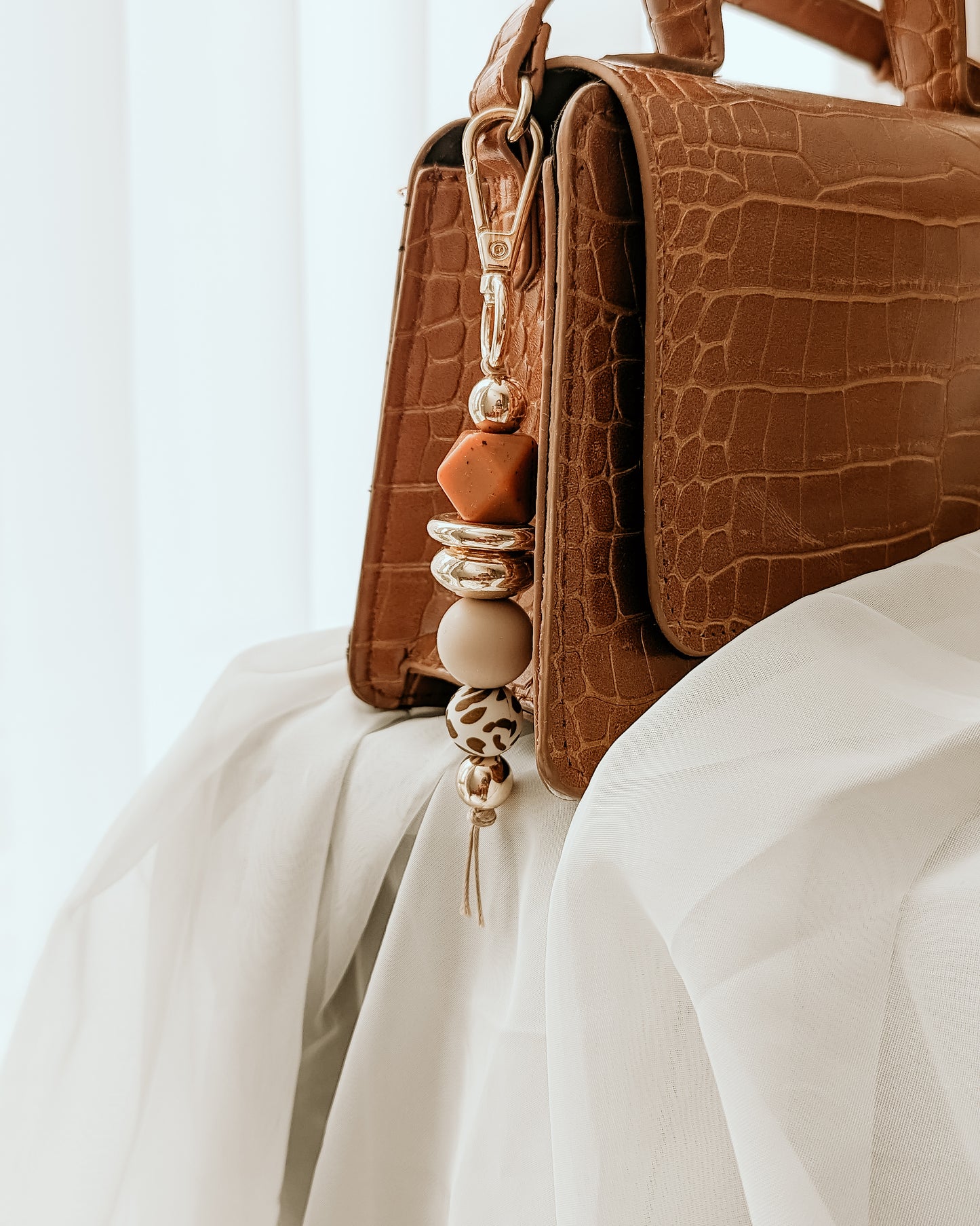The Ultimate Tan Bag Tag/Keyrings