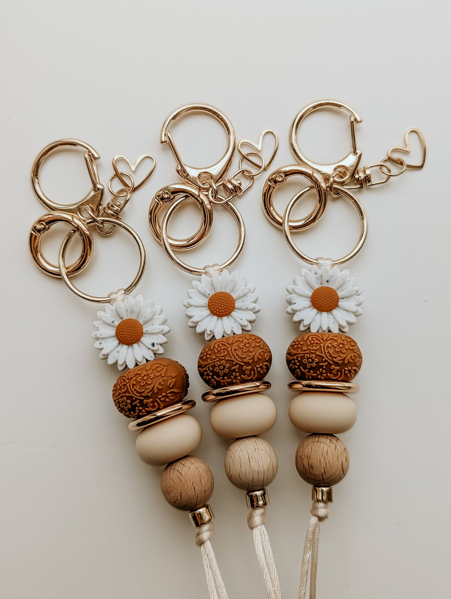 Tan Floral Embossed Keyrings