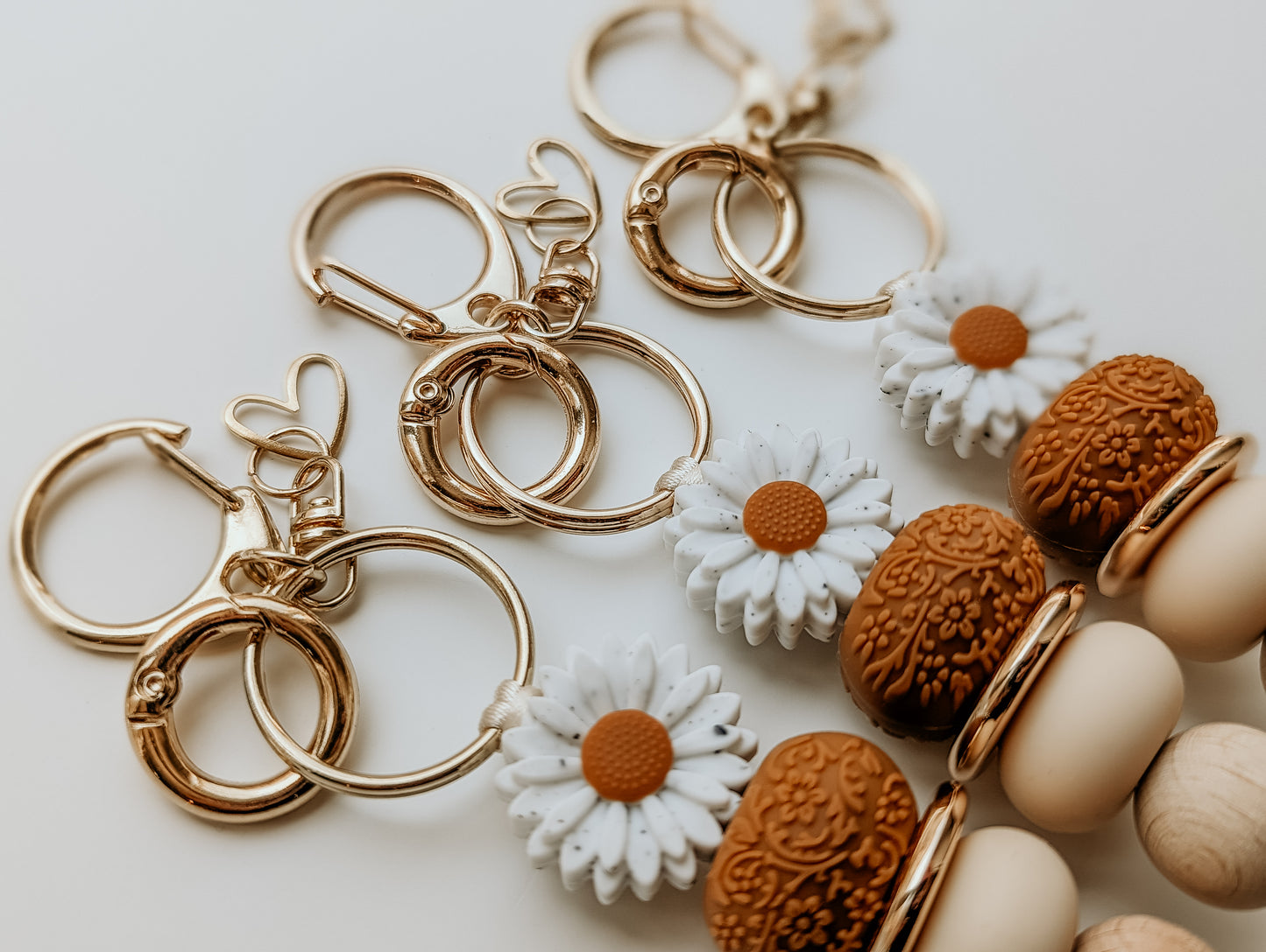 Tan Floral Embossed Keyrings