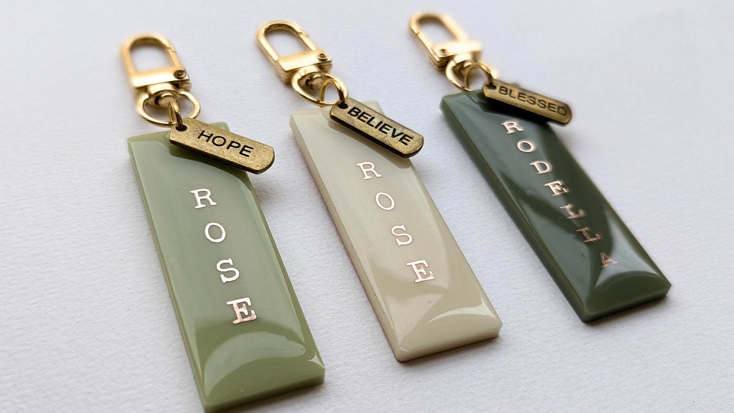 Personalised tags with antique bronze inspirational words