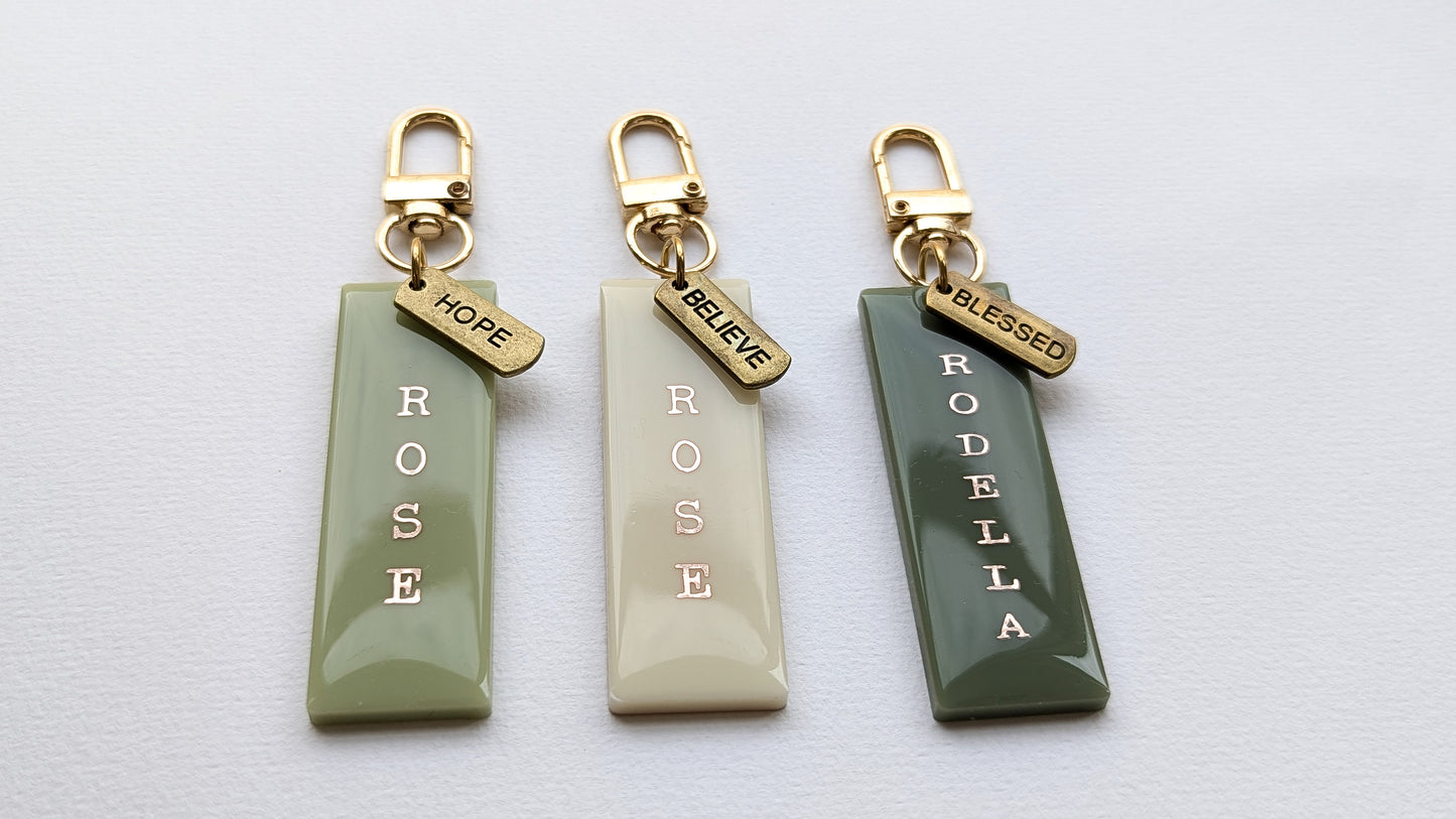 Personalised tags with antique bronze inspirational words