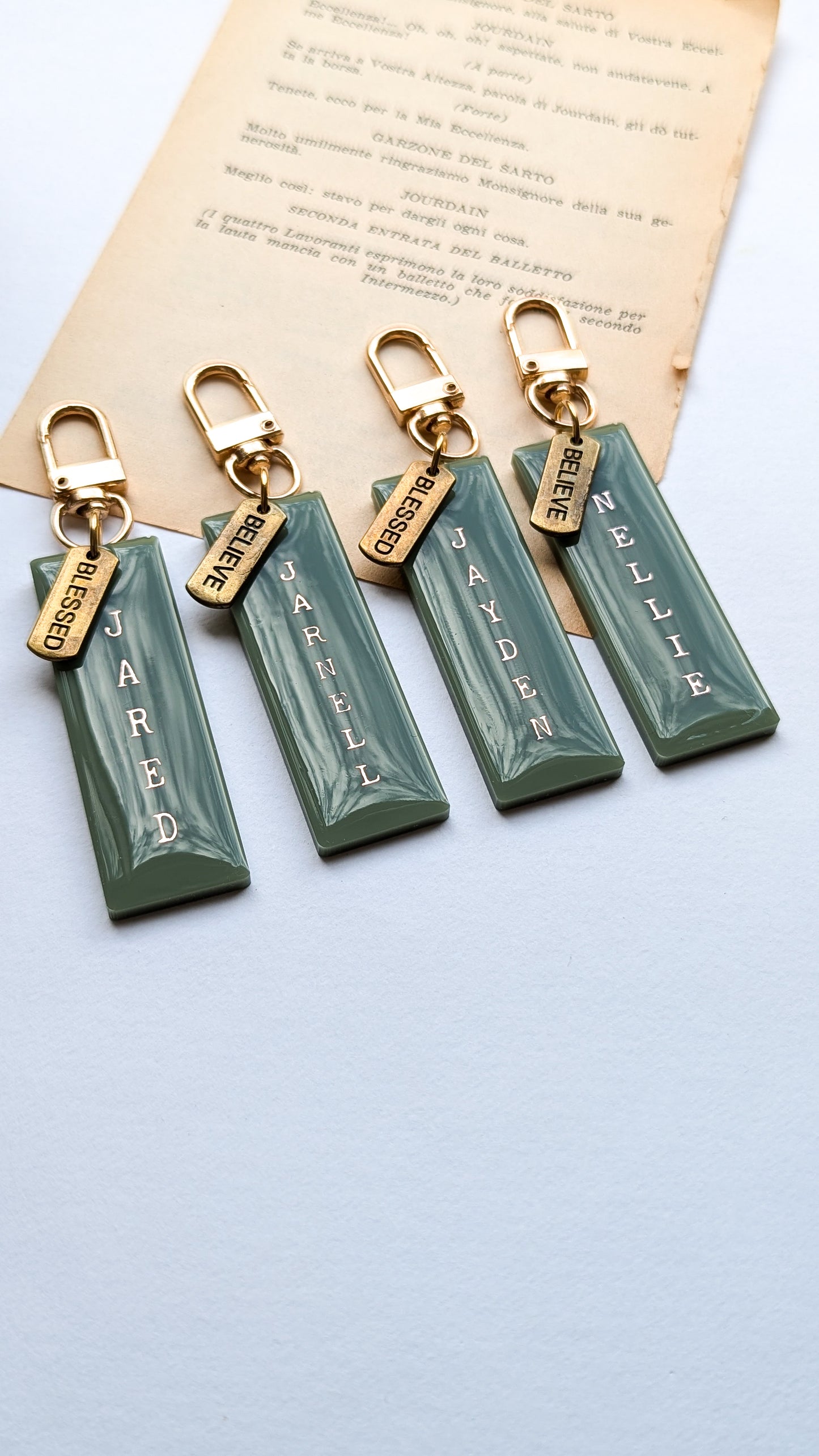 Personalised tags with antique bronze inspirational words