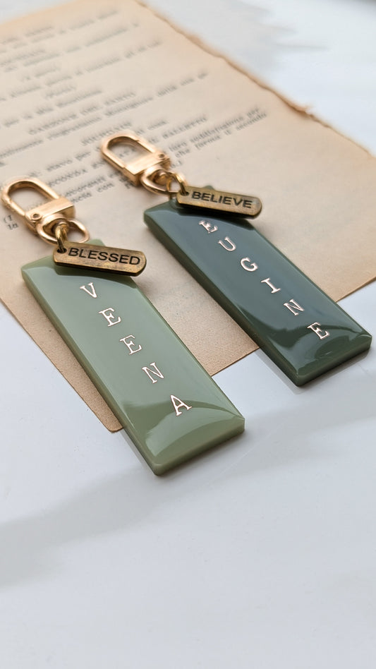 Personalised tags with antique bronze inspirational words